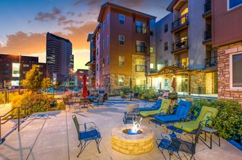 Outdoor living area with gas grills and fire pit